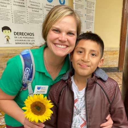 Dr Brown with child that needs surgery
